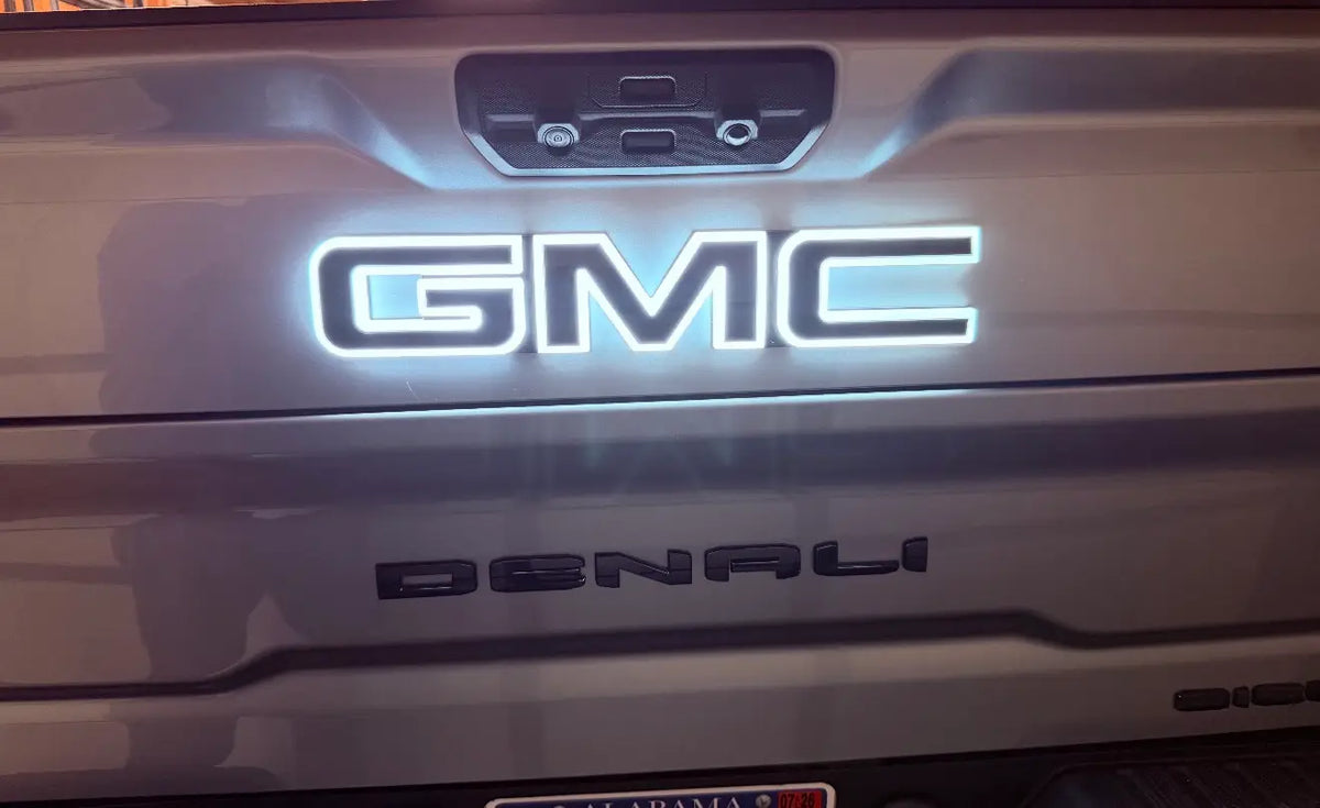 white illuminated gmc emblem on tailgate