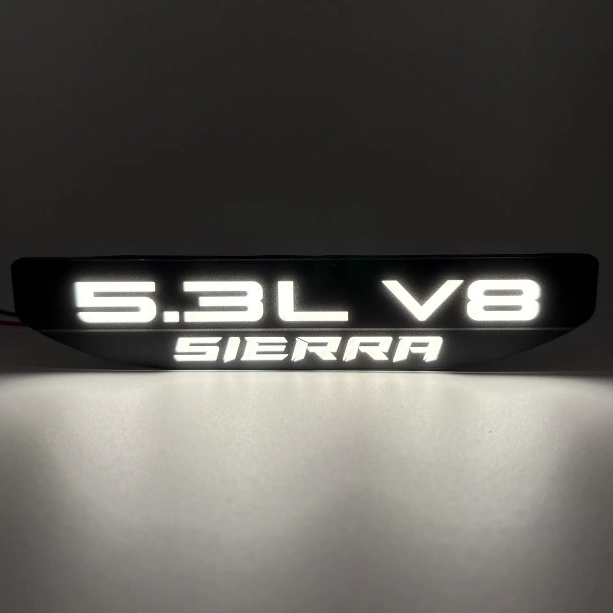 Sierra 1500 illuminated fender badge