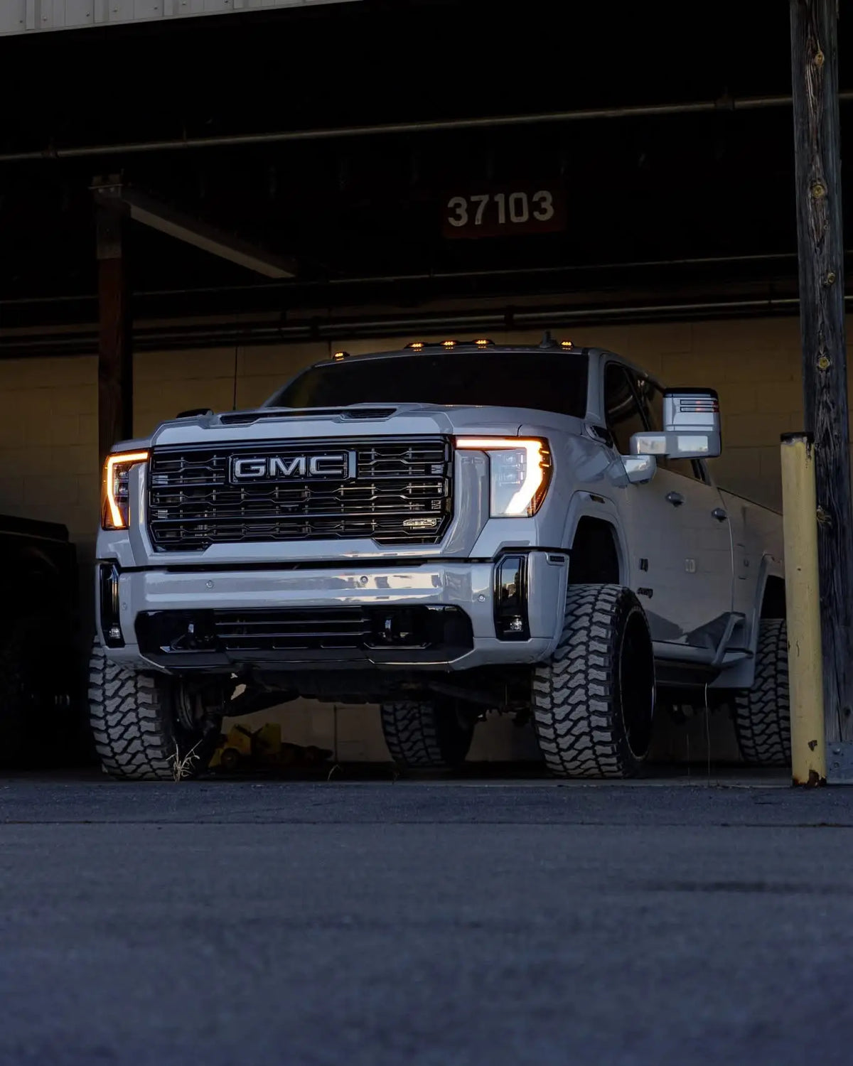 GMC truck featuring Venom Trucks amber DRL lighting