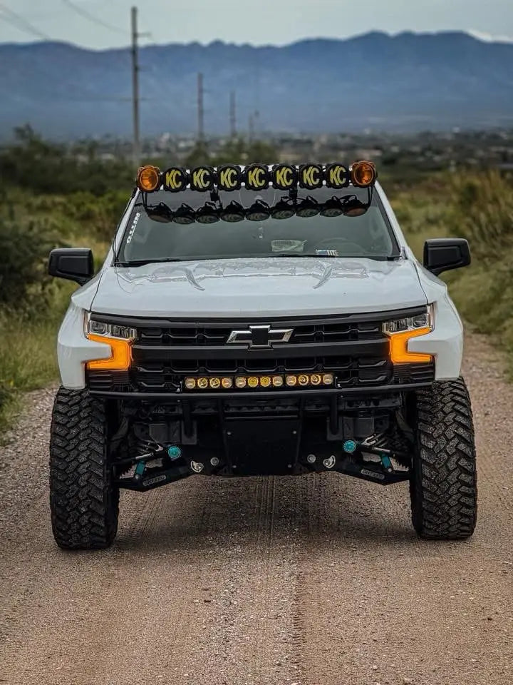 silverado offroading with amber lights
